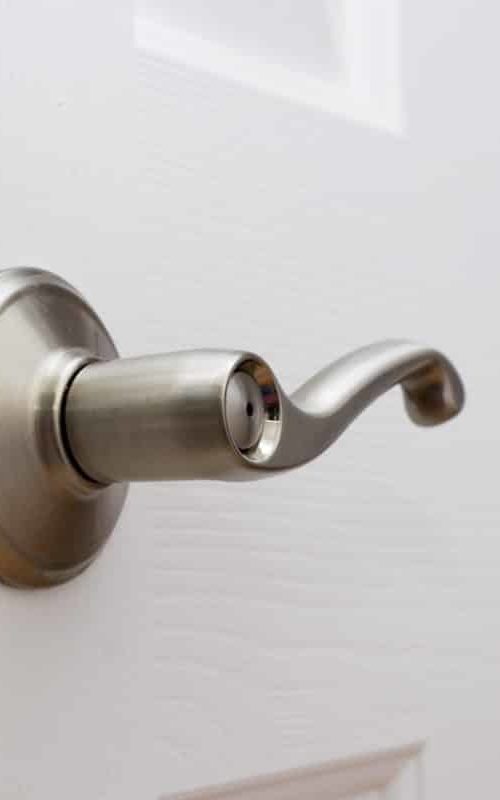Lever door handle with child safety lock